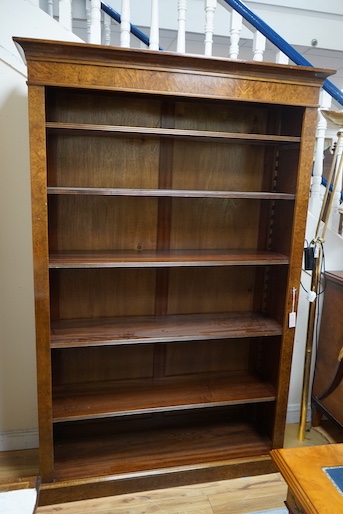 An Edwardian design bird's eye maple open bookcase, length 127cm, depth 32cm, height 193cm